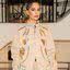 A atriz Camila Pitanga desfilou um look exclusivo com bordado artesanal de Timbaúba dos Batistas no Festival de Cannes, celebrando a cultura potiguar. - Divulgação
